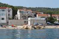 Exterior Sea front stone house