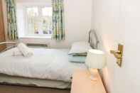 Kamar Tidur Poppy Cottage