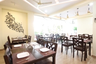 Restoran Treebo Trend Ivory House