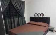 Kamar Tidur 3 Araaz Homestay