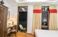 Kamar Tidur 5 Woodside Inn & Serviced Apartments