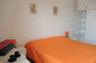 Phòng ngủ Condominio Cavallino Sud
