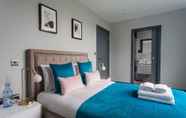 Bedroom 5 Boutique Apartments by Flying Butler