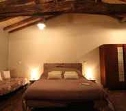 ห้องนอน 4 Chambres d'hôtes Le Chateau Rouge