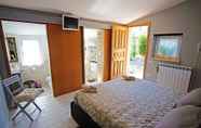 Kamar Tidur 3 Romantica Evasione Bed & Breakfast