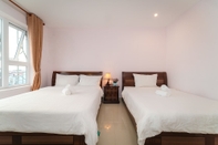 Kamar Tidur The Sun Apartment & Hotel