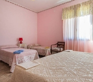 Bilik Tidur 5 Agriturismo Cuaddus e Tellas