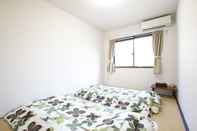 Kamar Tidur Uzushio Guest House