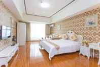 Kamar Tidur Home Inn Huaxu Apartment