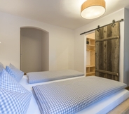 Kamar Tidur 6 Ferienhaus Badersee