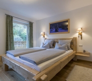 Kamar Tidur 7 Ferienhaus Badersee