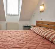 ห้องนอน 7 Chambres d'Hôtes du Colvert