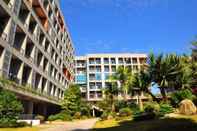 Bangunan BaiHe International Apartment Hotel