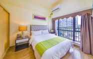 Kamar Tidur 7 BaiHe International Apartment Hotel