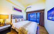 Kamar Tidur 5 BaiHe International Apartment Hotel