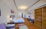 Bilik Tidur 2 Atlantis International Holiday Apartment Hotel (Luogang Wanda Square)