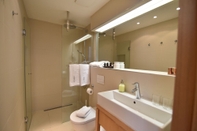 In-room Bathroom The Bridge Luxury Apartments