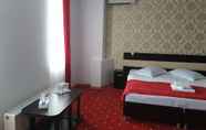 Kamar Tidur 5 Hotel Magic City Center