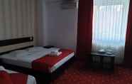 Kamar Tidur 6 Hotel Magic City Center