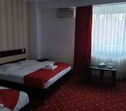 Bedroom 6 Hotel Magic City Center