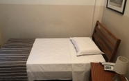 Kamar Tidur 7 Hotel Metrópole