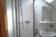 ห้องน้ำภายในห้อง Gasthaus zum Frohsinn