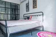 Kamar Tidur Snail Home Inn