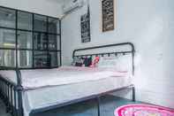 Kamar Tidur Snail Home Inn