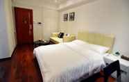 Kamar Tidur 3 Sixiangjia Apart Hotel Foshan