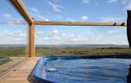 สิ่งอำนวยความสะดวกด้านความบันเทิง 5 Blue View Cabin 1A with Hot Tub