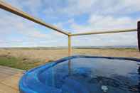 สิ่งอำนวยความสะดวกด้านความบันเทิง Blue View Cabin 3A with Hot Tub