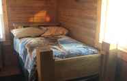 Bilik Tidur 5 Alaska log cabins on the pond B & B