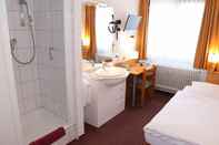 Phòng tắm bên trong Hotel Garni Kluth