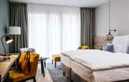 Bedroom 7 AMERON Neuschwanstein Alpsee Resort & Spa