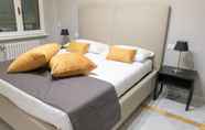 Bedroom 5 Compasso Suites