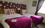 Kamar Tidur 4 Carnately Lodge Ballycastle