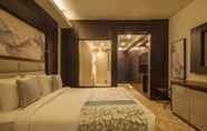 Bilik Tidur 6 Triumph Luxury Hotel