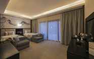 Bilik Tidur 5 Triumph Luxury Hotel