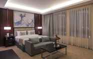 Bilik Tidur 3 Triumph Luxury Hotel