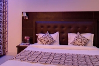 Kamar Tidur Hotel Lords Highway Inn