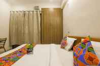 Kamar Tidur FabExpress Star Guest House