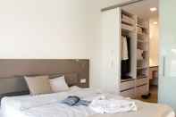 Bedroom Lumina Apartments