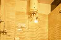 Phòng tắm bên trong Hotel Mayur