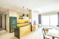 ห้องนอน Sunrise City Alm's Luxury Apartment