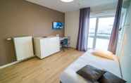 Bedroom 5 All Suites Massy Palaiseau