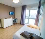 Kamar Tidur 5 All Suites Massy Palaiseau