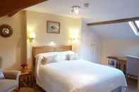 Kamar Tidur Howard's House Hotel