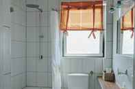 Phòng tắm bên trong Apartmenthaus am Rhein