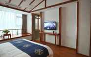 Kamar Tidur 7 City Cottage Hotel Yipintianxia Branch