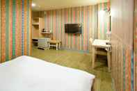 ห้องนอน Skoal Hotel